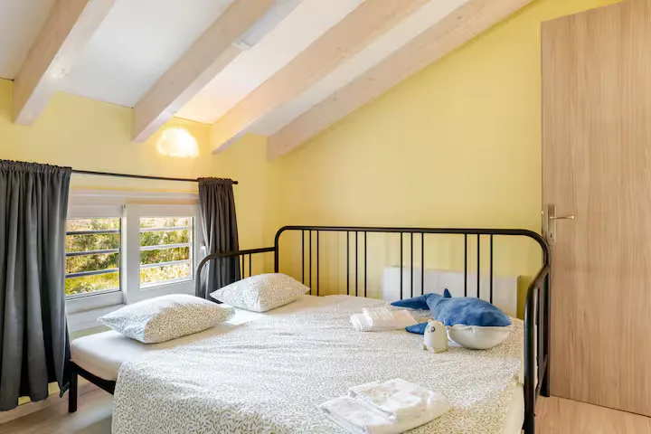 Cosy attic-style bedroom with its own writing nook