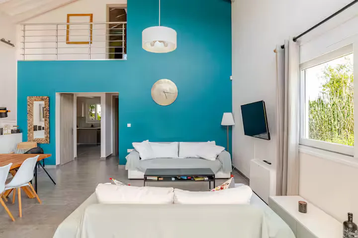 Teal-toned living room with a coastal feel